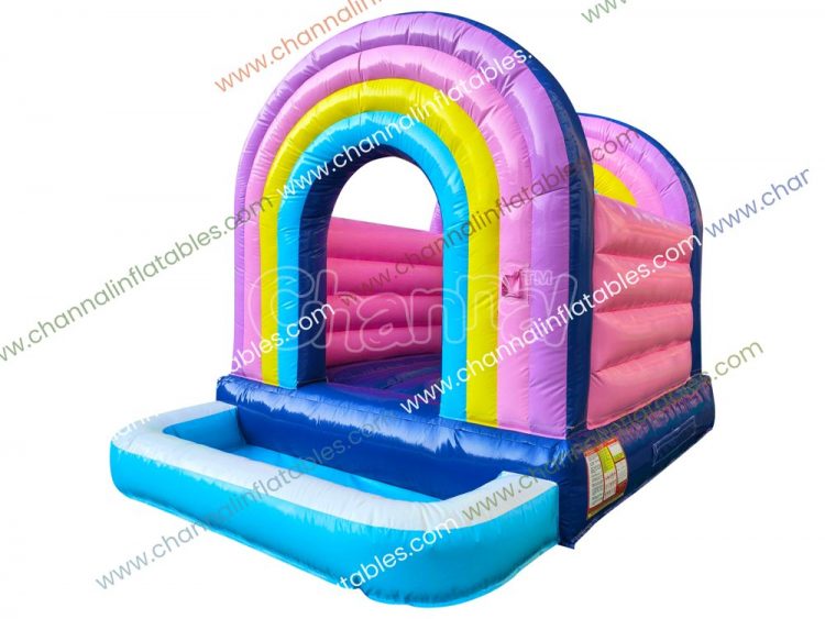 pink rainbow inflatable bouncer