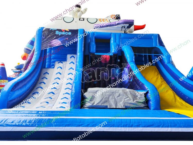 warped wall and slide on space theme inflatable playground